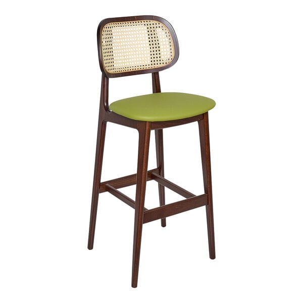 A BFM Seating barstool with a wooden frame and green vinyl seat.