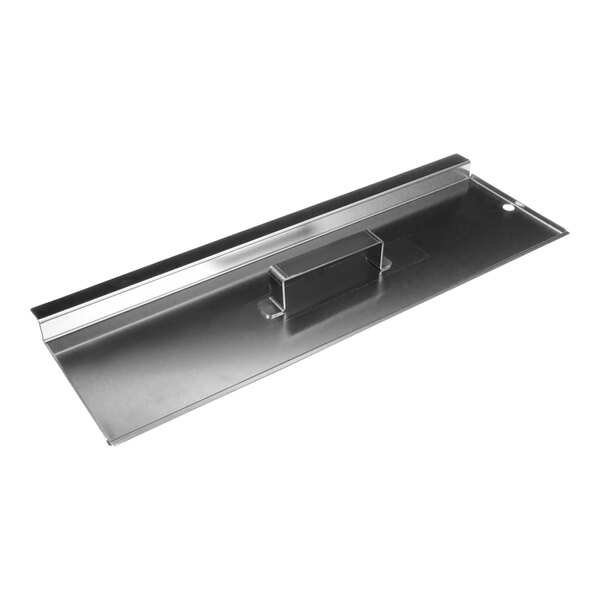 A stainless steel cover with a rectangular handle.