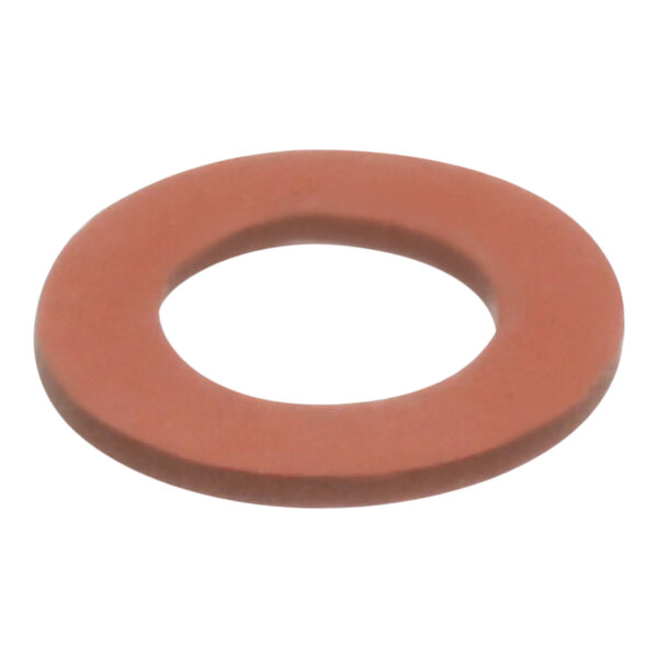 A close-up of a red rubber gasket with a white oval shape in the middle.