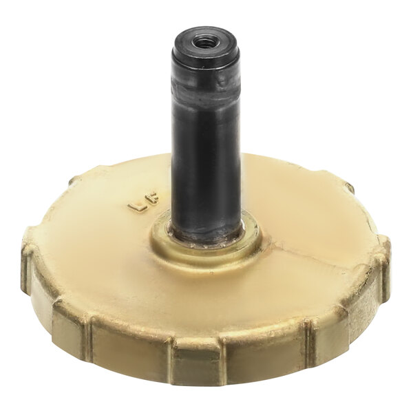 A brass CMA Dishmachines water solenoid valve with a black cap.