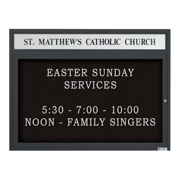 A black United Visual Products enclosed church letterboard with white text on a white background.