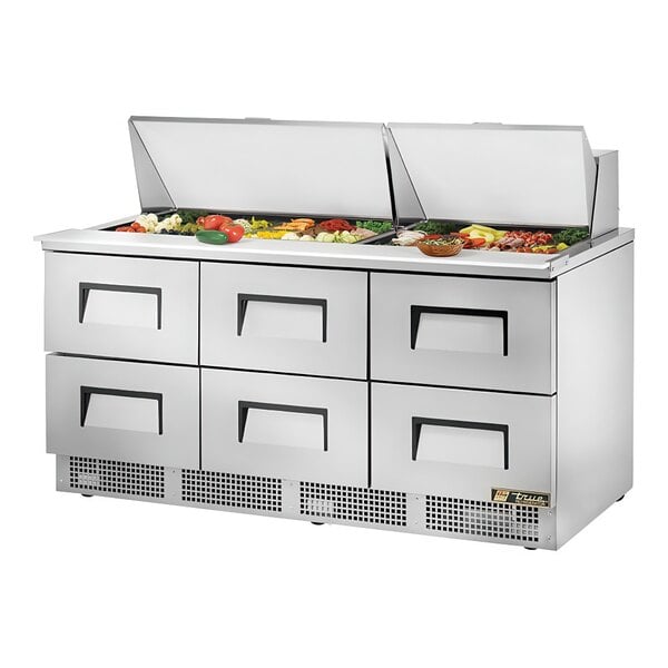 A True 72" Mega Top Refrigerated Sandwich Prep Table with 6 drawers.