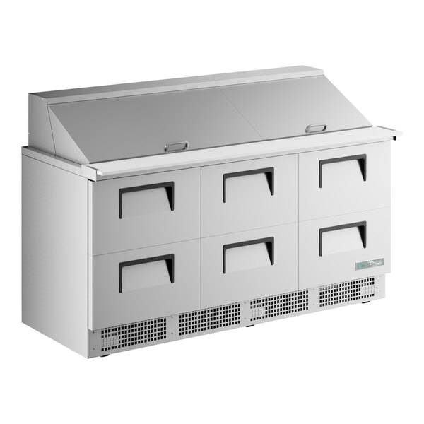 A stainless steel True 6 drawer mega top sandwich prep table.