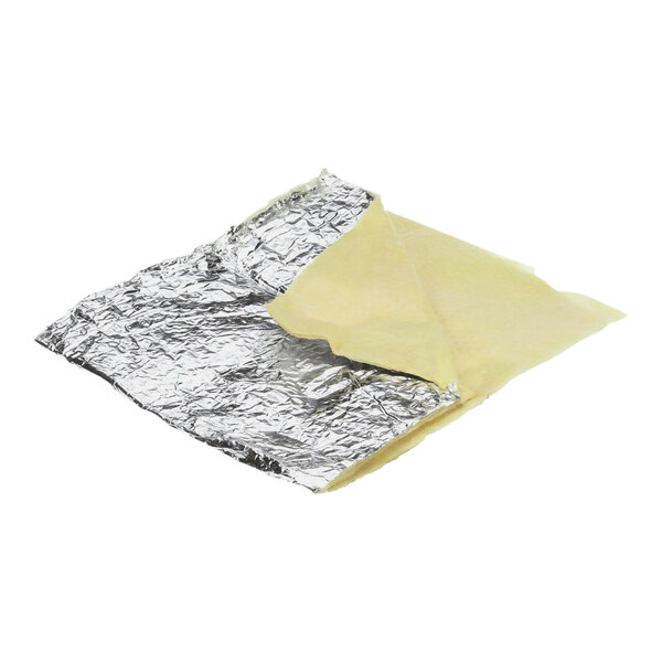 A foil wrapped piece of insulation with a white background.