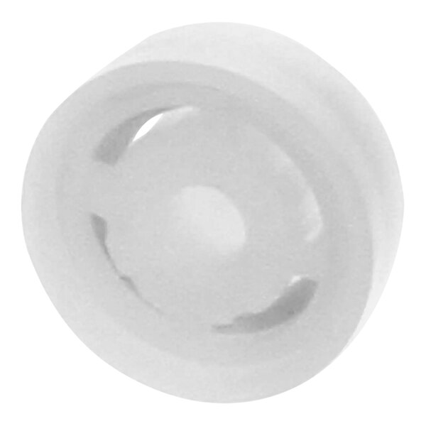 A white plastic wheel with holes.