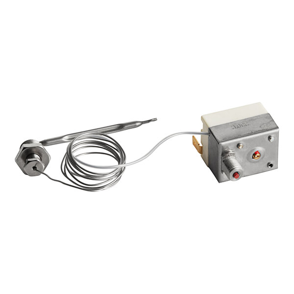 A Cooking Performance Group high limit thermostat, a small metal device with wires.