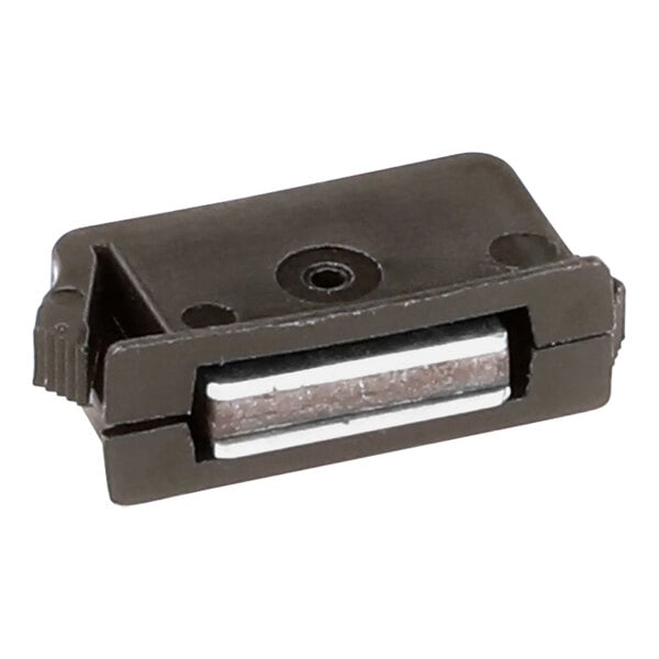 A black plastic object with a metal strip.