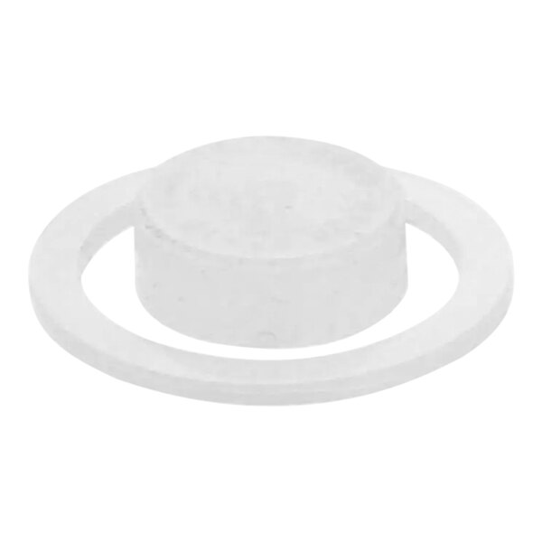 A white plastic circle with a hole in it.