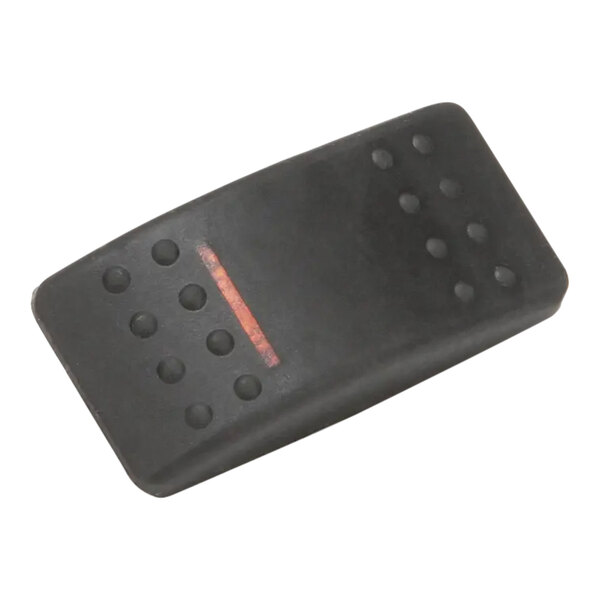 A black rectangular rubber pad with red dots and holes.