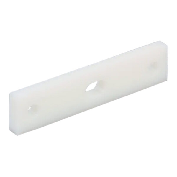 A white rectangular plastic piece with holes.