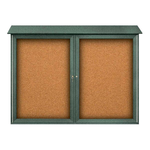 A cork board with a green frame.