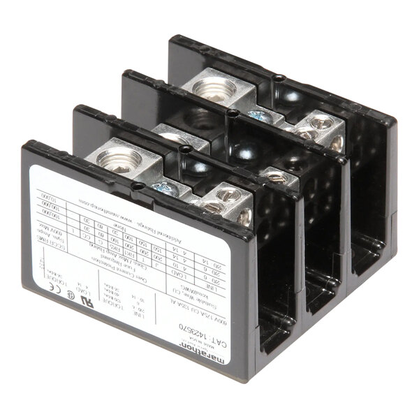 A Frymaster 3 pole terminal block with black and silver electrical connections.