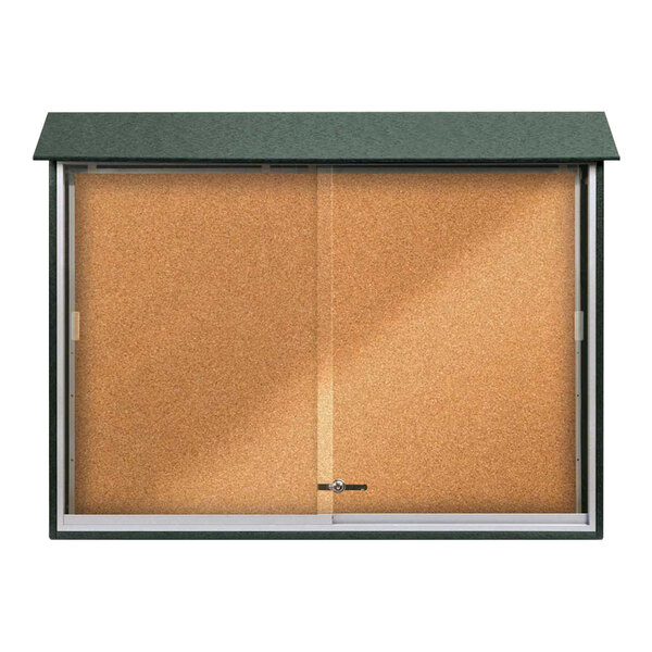 A cork board with a green top.