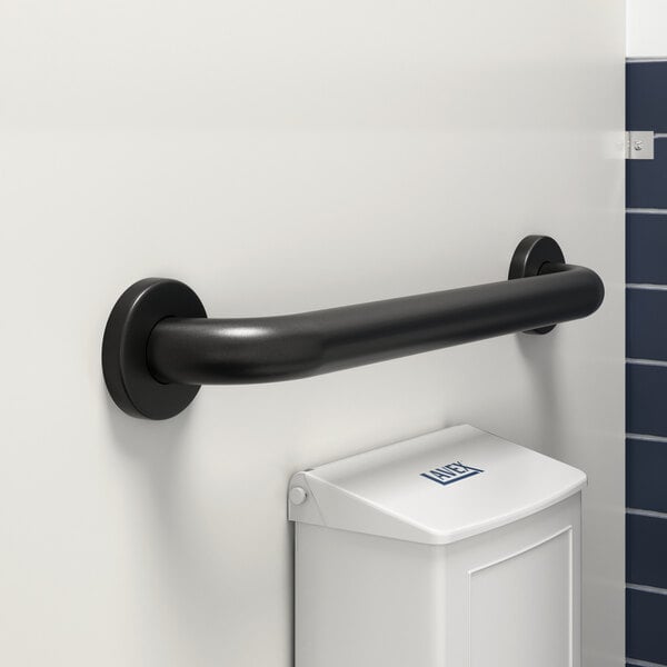 A Lavex 18" restroom grab bar with a matte black finish installed on a white wall.