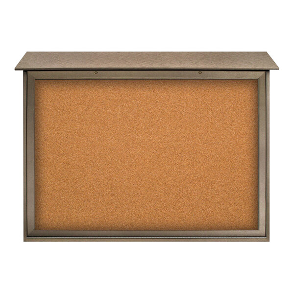 A United Visual Products cork board with a weathered wood frame on the bottom.