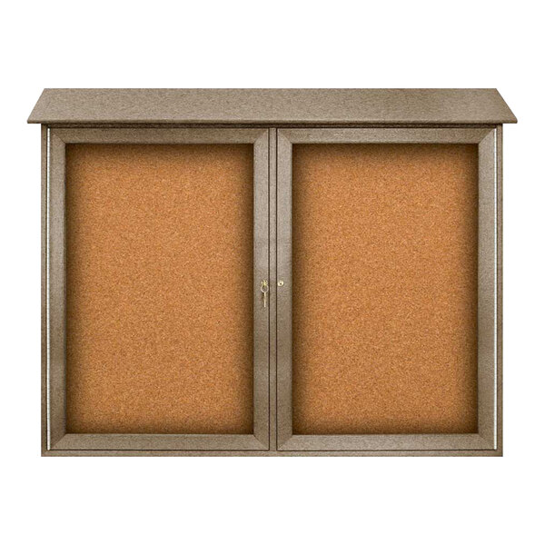 A brown United Visual Products double door message center with corkboard.