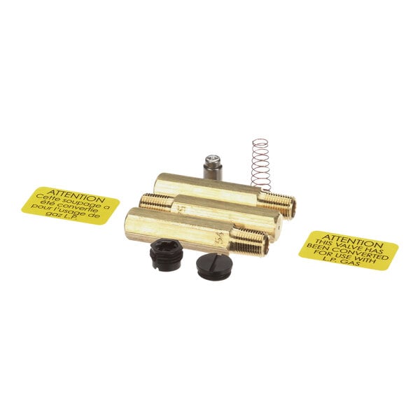 A brass Frymaster gas valve conversion kit with two springs.