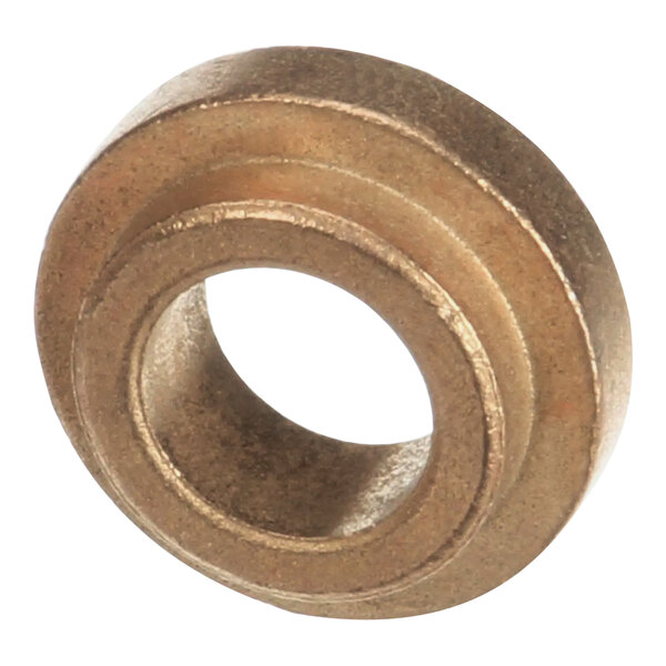 A close-up of a bronze bush bearing.