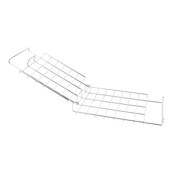 A metal grid with a wire handle on it.