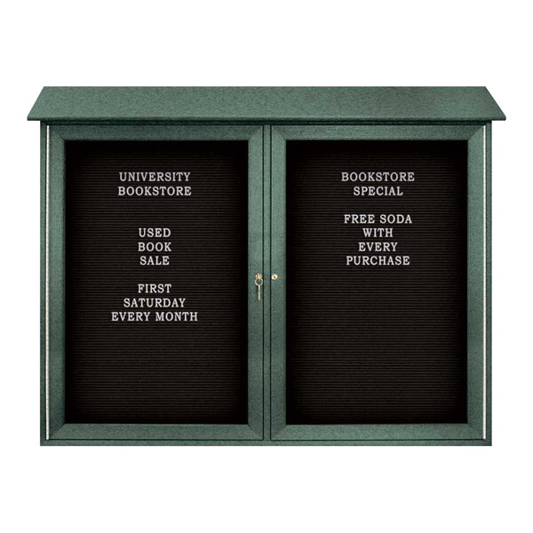 A green double door bulletin board with black lettering on white felt.