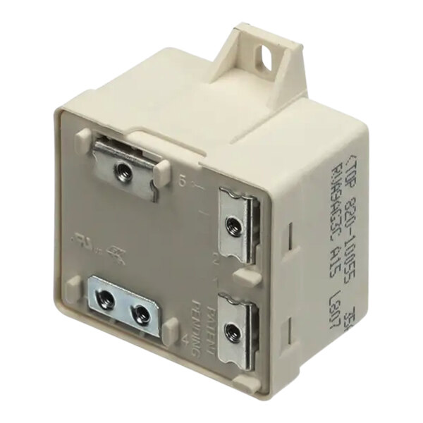 A white and gray Follett relay box with metal screws.