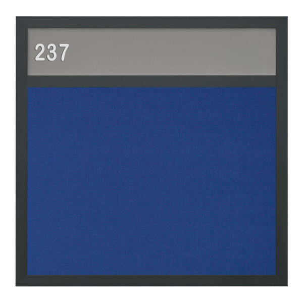 A blue bulletin board with a black frame and grey border.