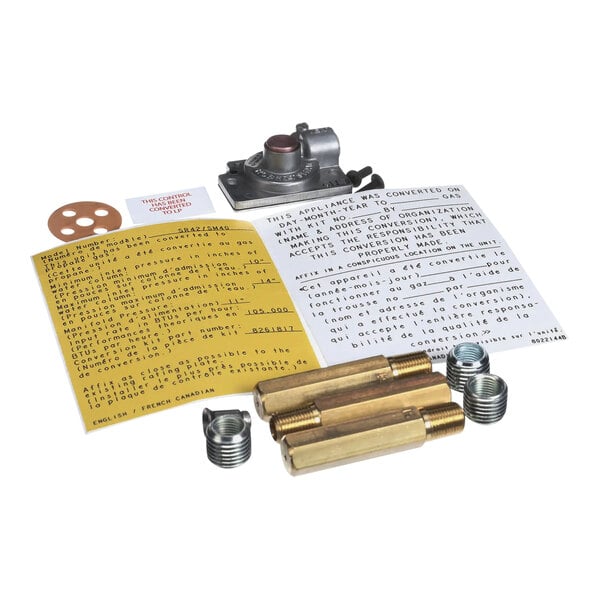 A Frymaster natural to LP gas valve conversion kit with brass and metal parts.