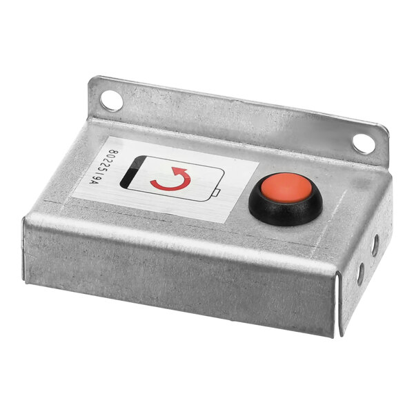 A metal bracket assembly with a metal box and a red button.