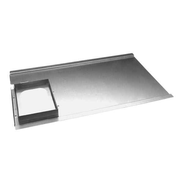 A metal tray with a hole.