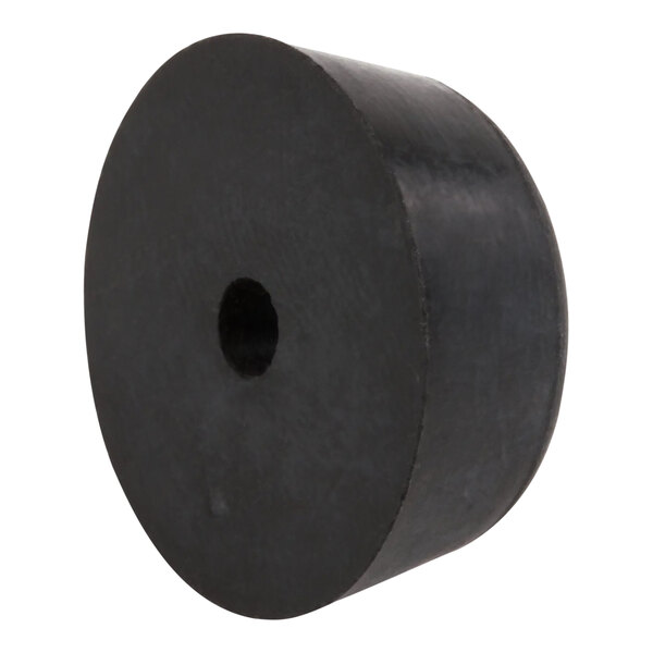 A black rubber circle with a hole in the center.