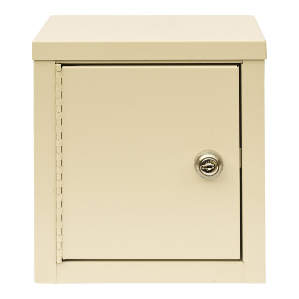 A beige steel mini wall-mount narcotics cabinet with 2 key locks.