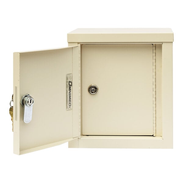 A beige steel Omnimed mini wall-mount narcotics cabinet with 2 key locks.