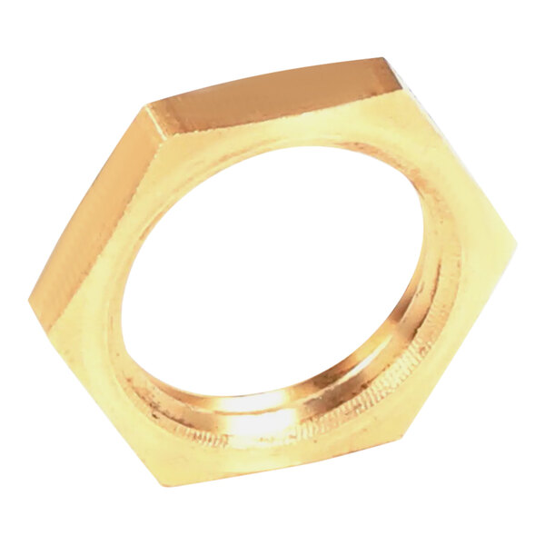 A gold hexagon shaped nut with a hole in the center.