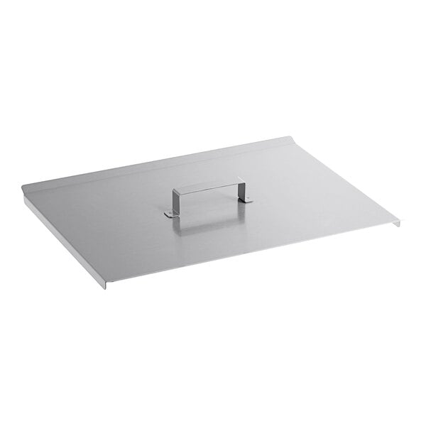 A silver metal rectangular lid with a handle.