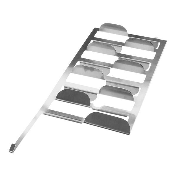 A metal baffle with holes in a metal rack.