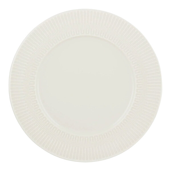 A white Schonwald porcelain plate with a pattern.