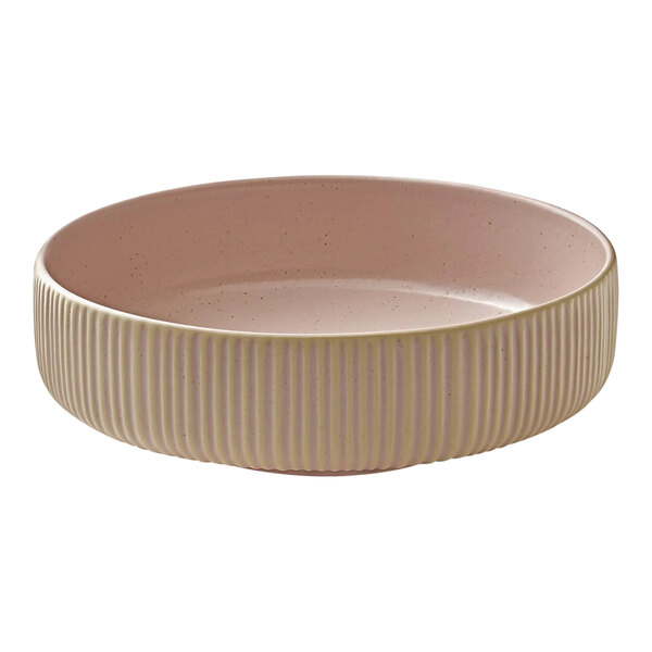 A Playground Nara stoneware rose bowl with a gold stripe.