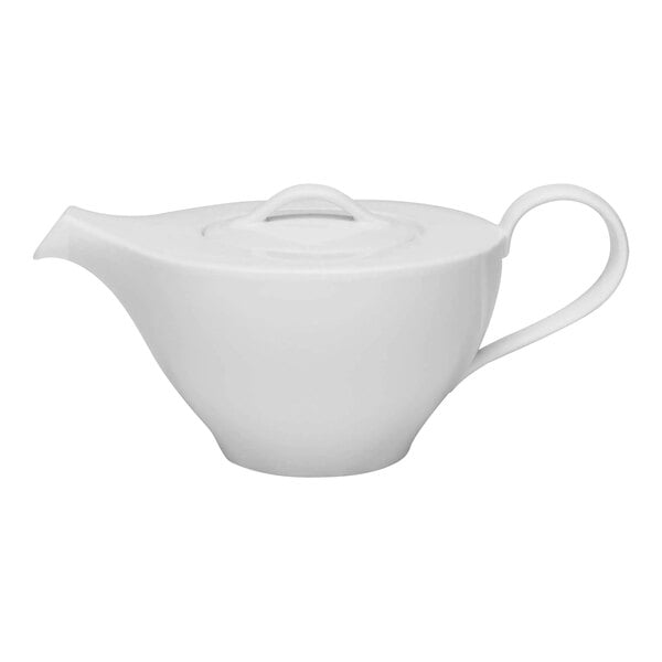 A white Schonwald teapot with a lid.