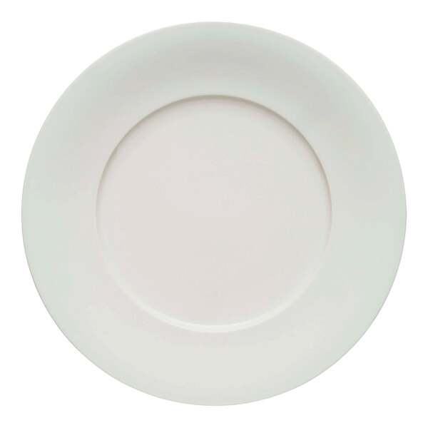 A close-up of a Schonwald Delight white porcelain plate with a round edge and a circle in the middle.