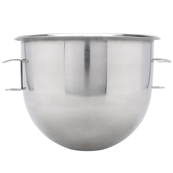 A silver Vollrath stainless steel mixing bowl with two handles.