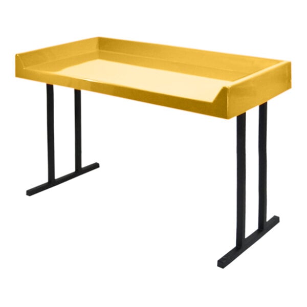 A yellow rectangular Sol-O-Matic laundromat folding table with black legs.