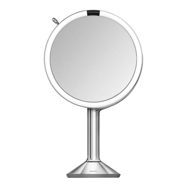 A round silver mirror with a silver pole.