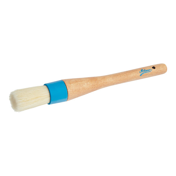 A round Ateco boar bristle basting/pastry brush with a wood handle.