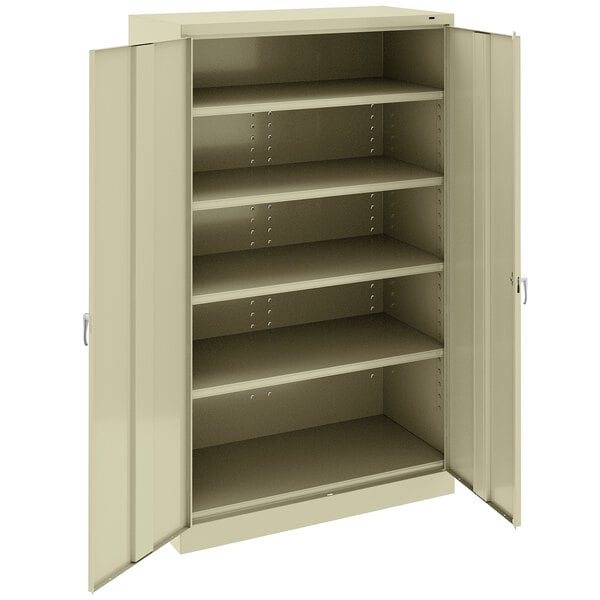 A tan metal Tennsco storage cabinet with open solid doors.