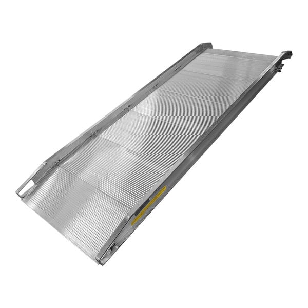 A silver B&P Manufacturing walk ramp with yellow twin tooth traction stripes.