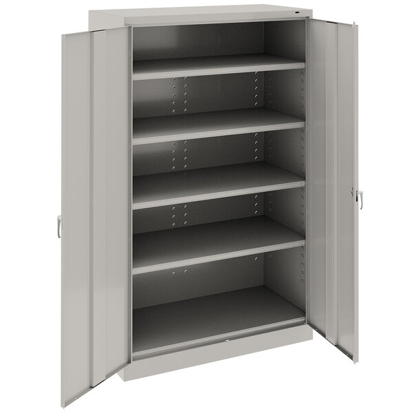 A light gray metal Tennsco storage cabinet with open solid doors.