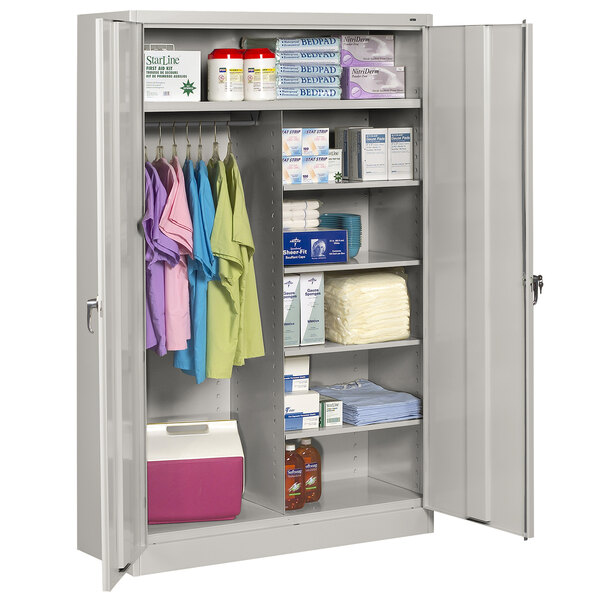 A light gray Tennsco jumbo combination cabinet with items on the shelves.