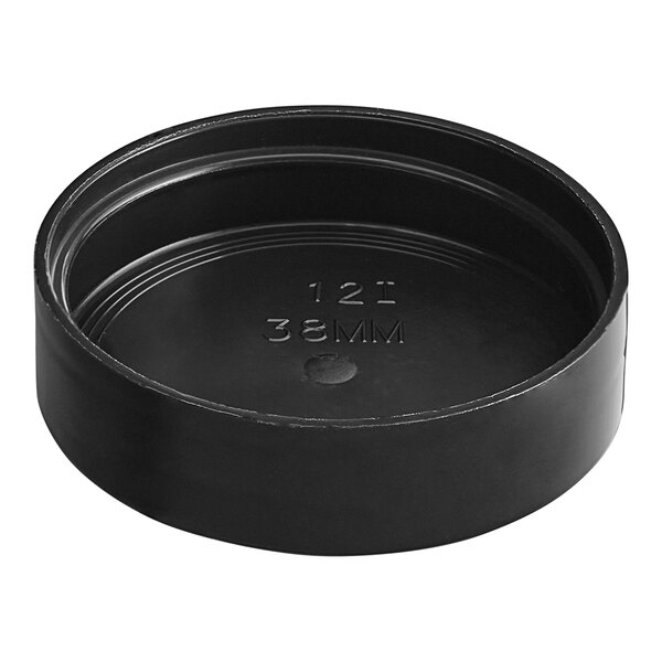 A black round plastic lid with a hole in it.