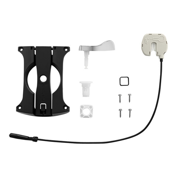 A black and white Flushmate handle replacement kit with a white circle on the black object.