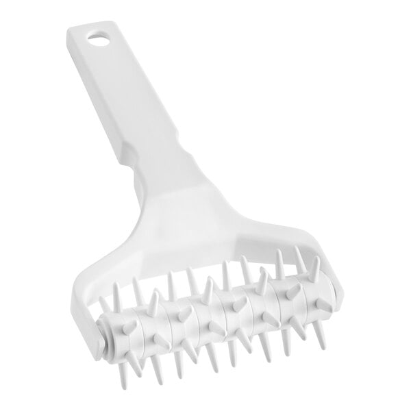A white plastic Ateco dough docker with spikes.